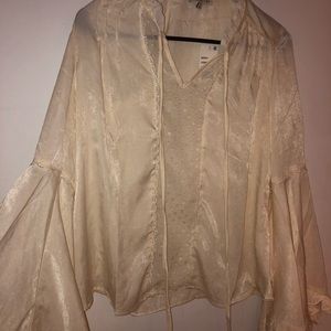 cream colored peasant blouse